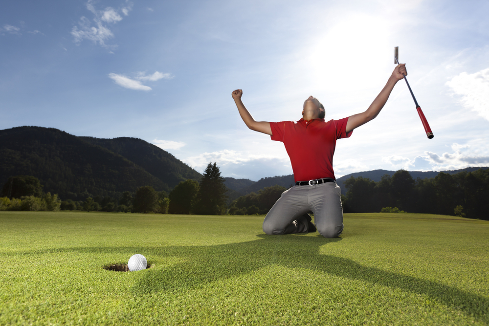 Professional,Young,Male,Golf,Player,On,Knees,And,Arms,Raised